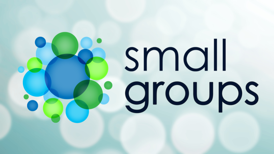 Small groups logo with blue and green circles on a light bokeh background