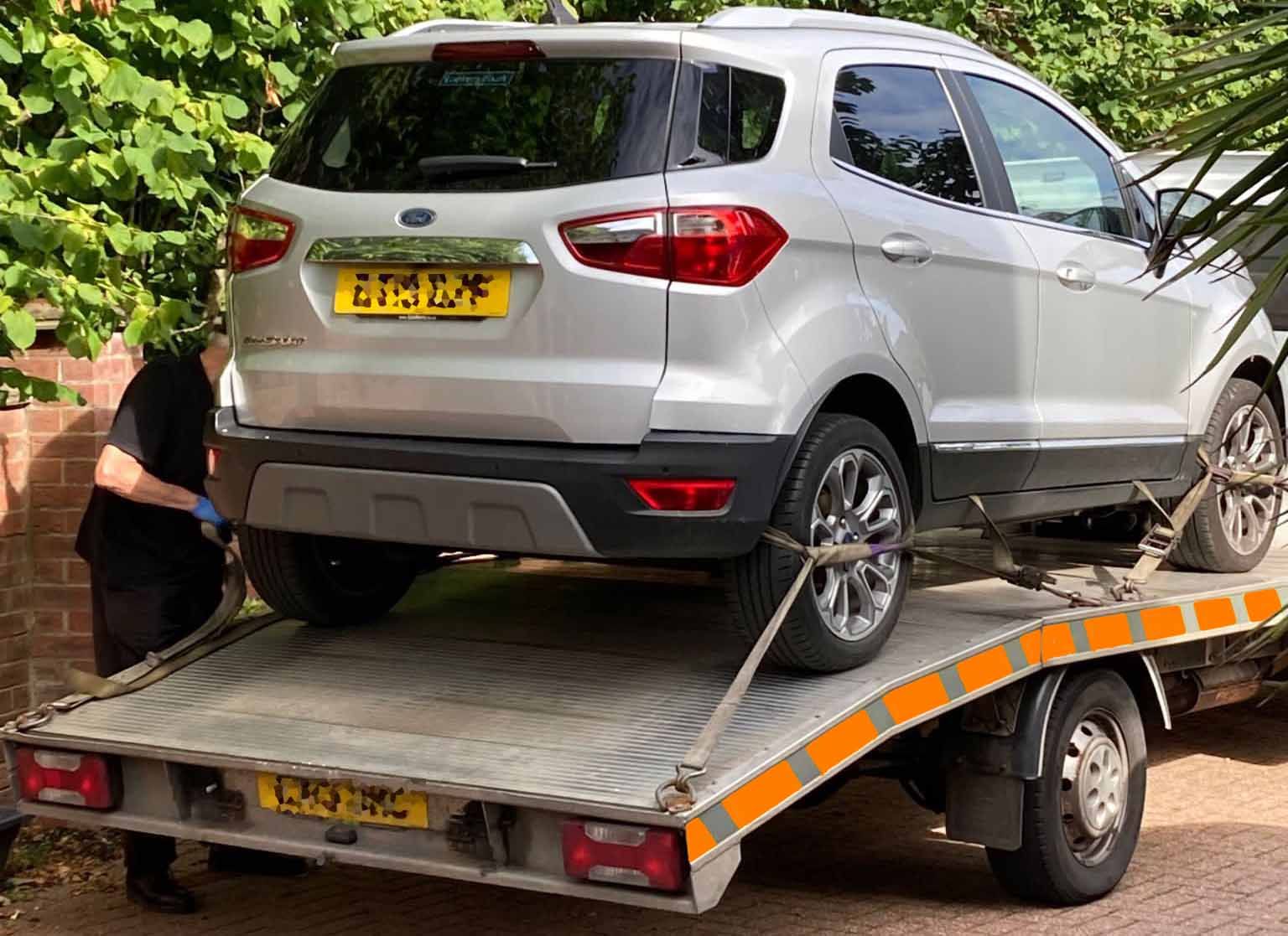 Ford eco sport being towed away by Benfleet Scrap