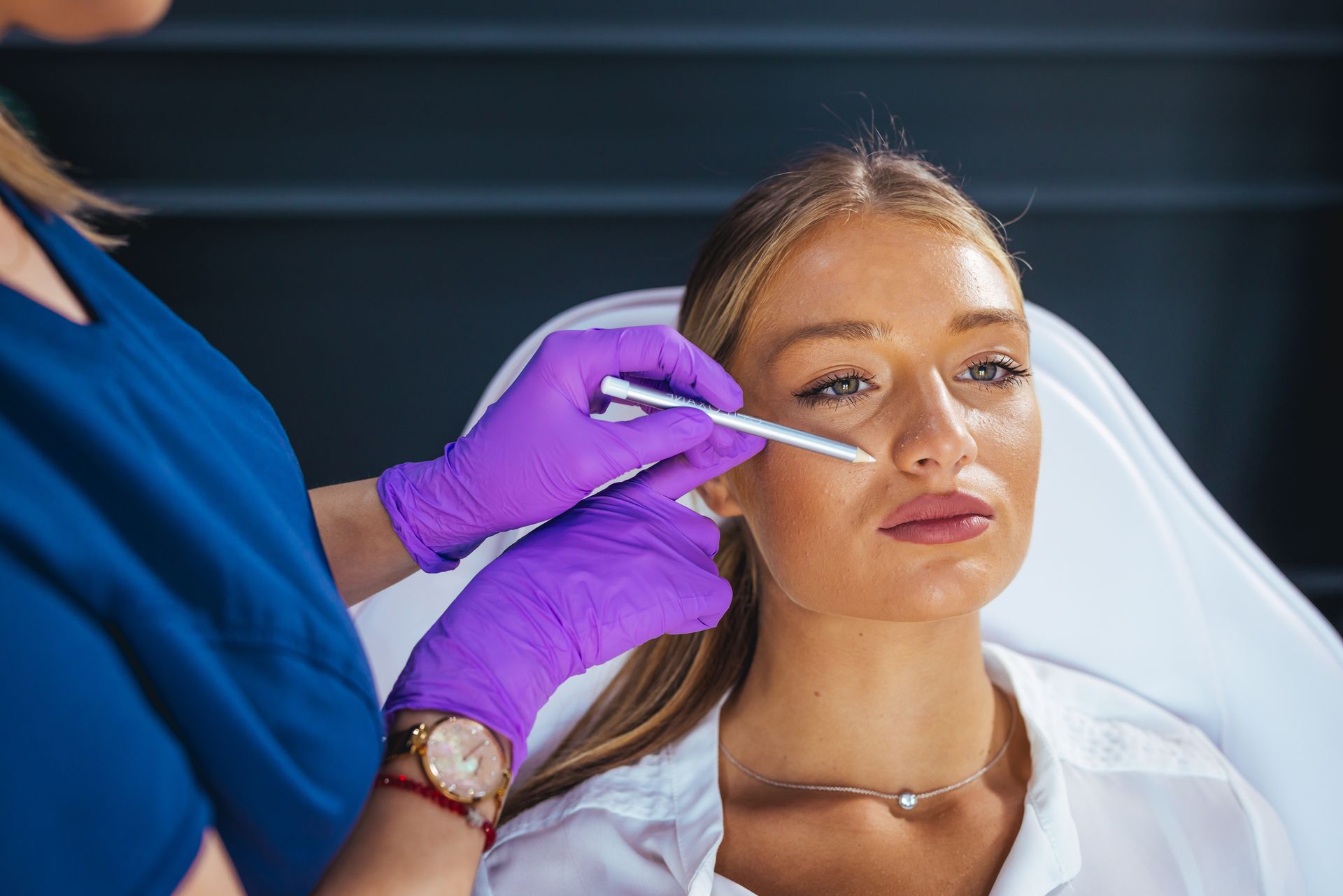 Cosmetic facial treatment in clinic.