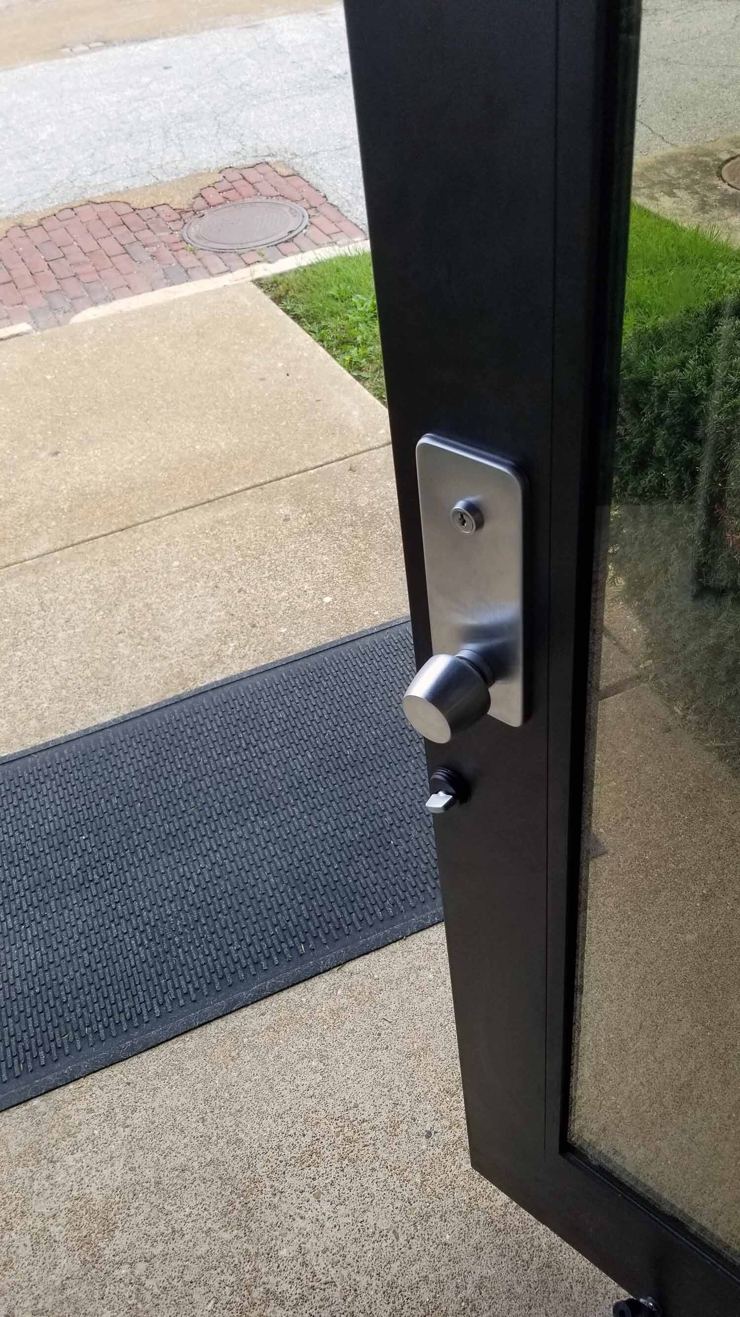 Door Frame Showing the Difference Between Black Anodized and Black Paint