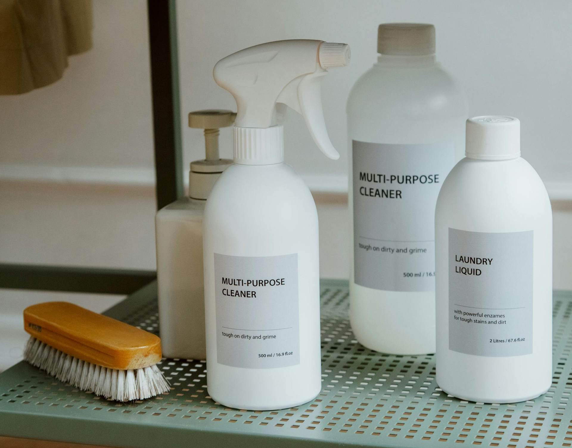 Three white bottles labeled