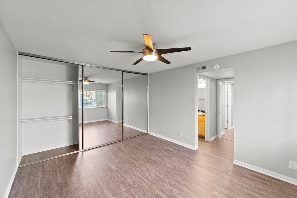 Sliding Photo Gallery Displaying Apartment Features - bedroom