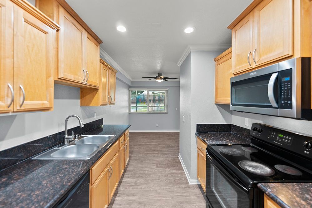 Sliding Photo Gallery Displaying Apartment Features -kitchen