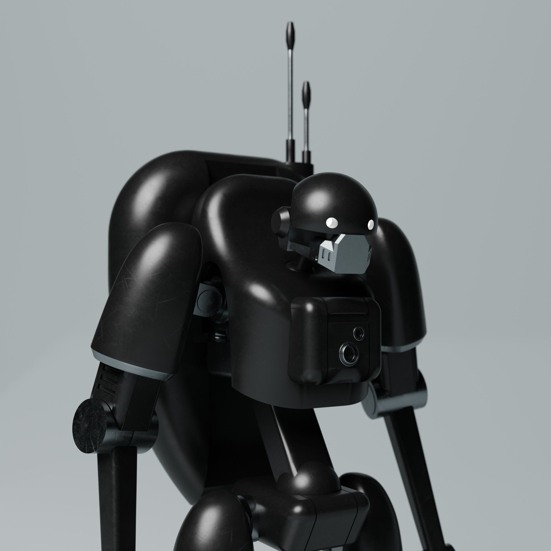 A black robot with a mask on its face