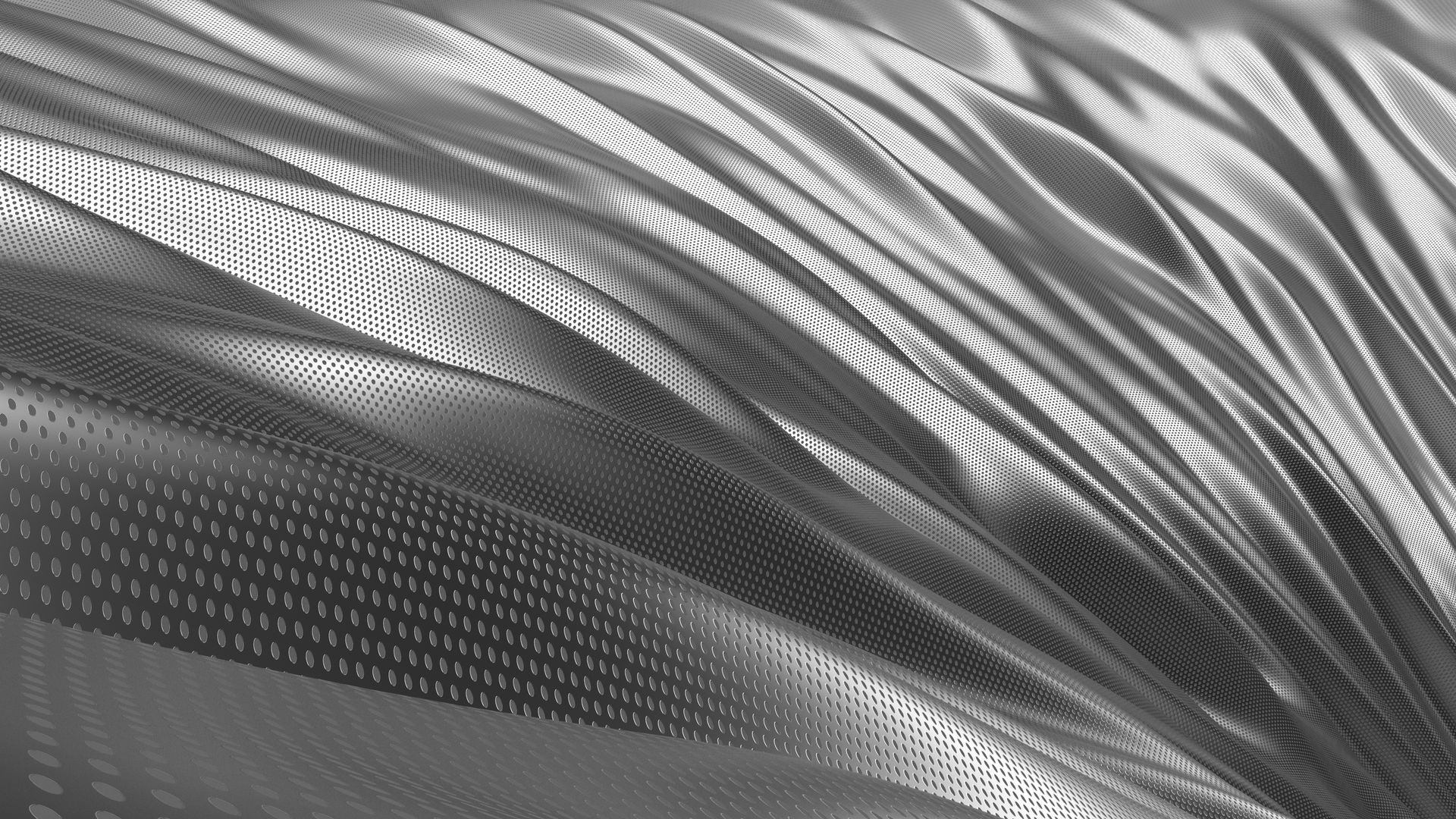 a close up of a silver fabric with a swirl pattern .