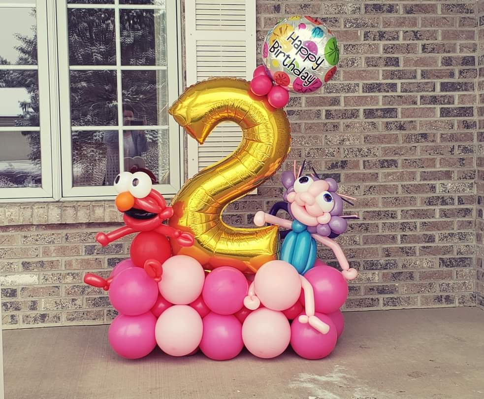Birthday balloon marquee, sesame street theme. Gold and pink. 