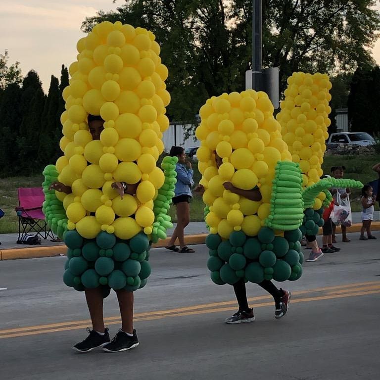 Custom balloon corn ear costumes for the annual Sun Prairie Corn Festival.