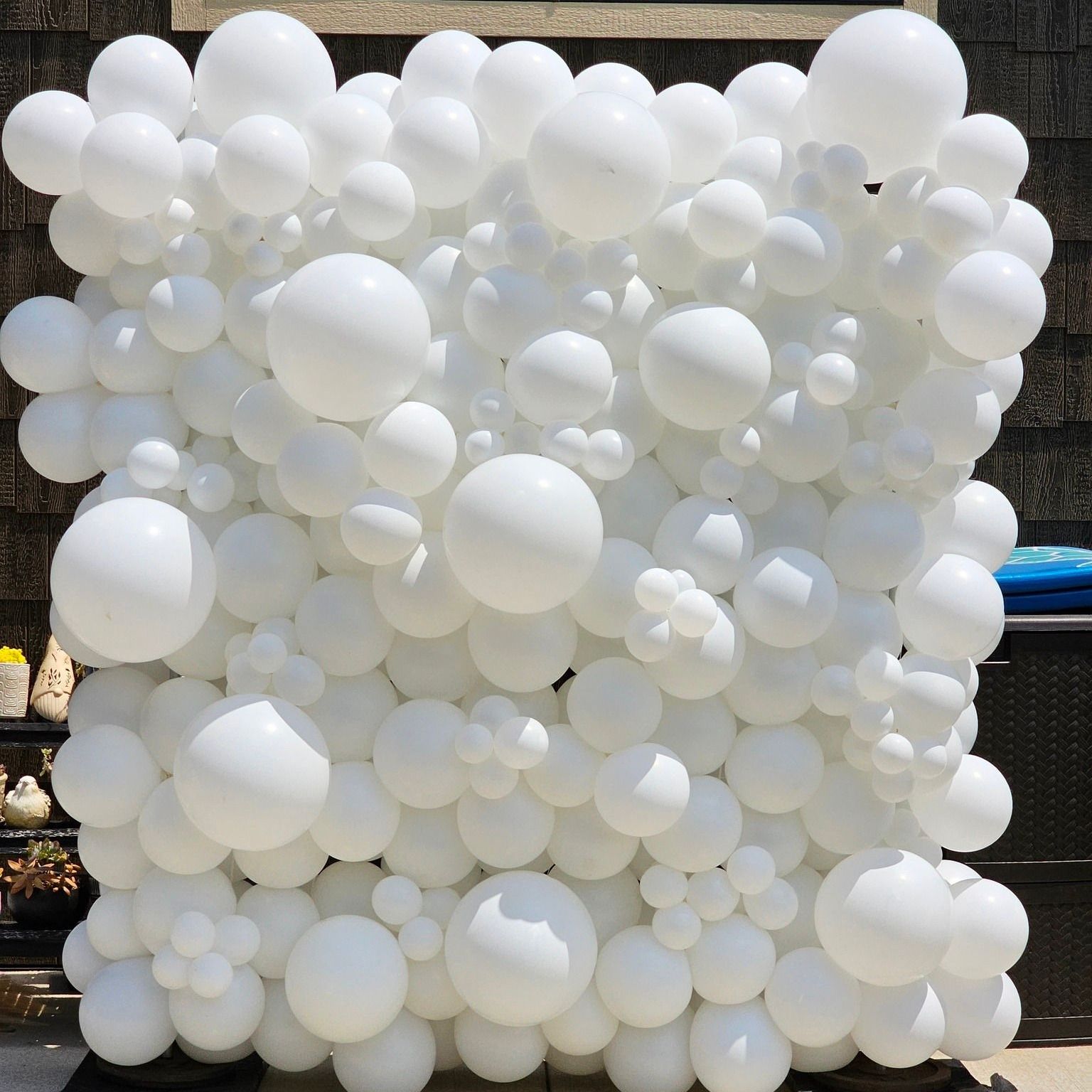 All white balloon wall for wedding shower. 