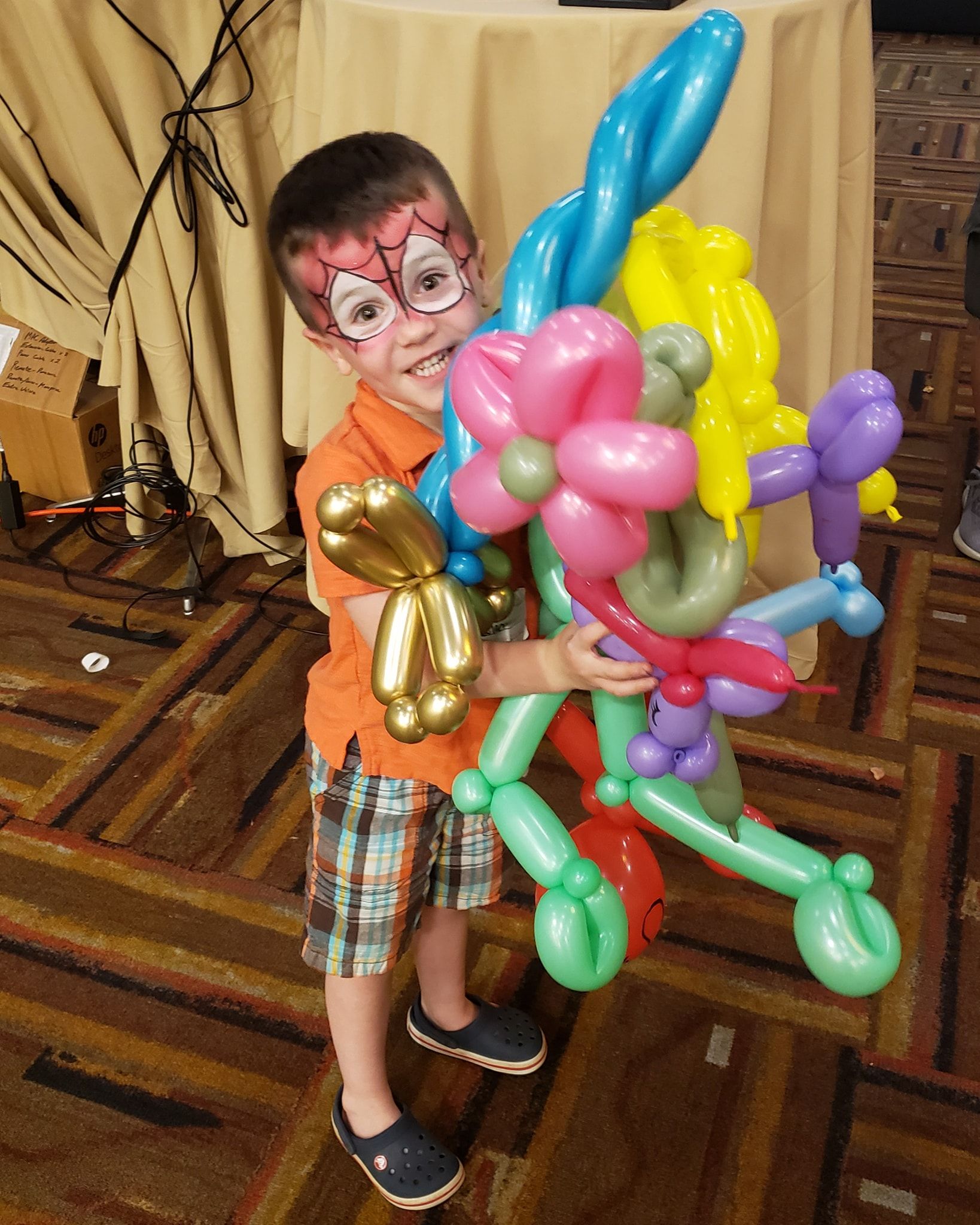 Assortment of balloon twisted flowers and dogs.