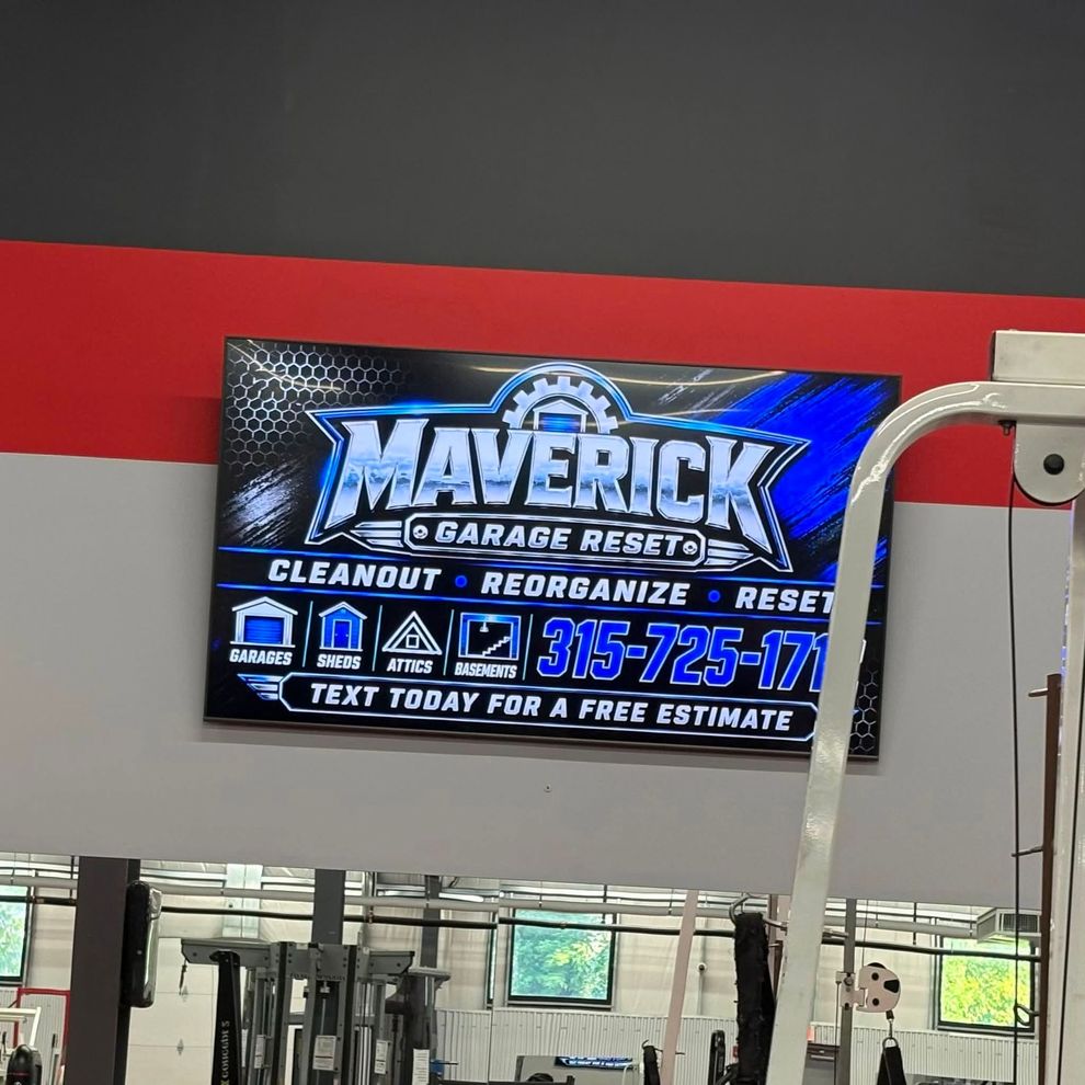 Maverick Garage banner in a gym, blue and white with cleanup, reorganization, and text-for-estimate phone number.