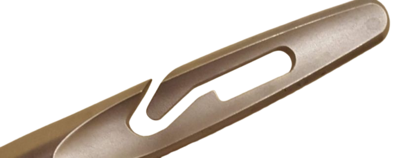 Close-up of a spiral eye needle with a slotted opening, on a white background