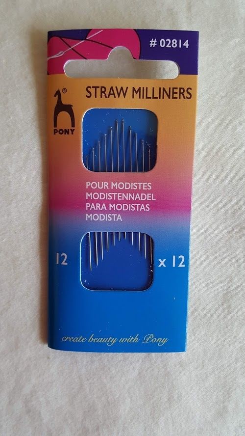 Package of blue straw milliners with pink top, labeled “12 x 12” for making artificial flowers.