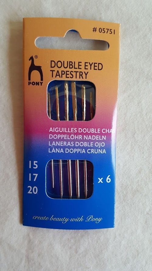 Package of size 15, 17, 20 double-eyed tapestry needles on an orange-blue card