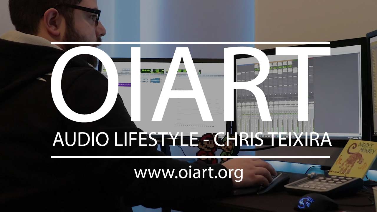 A man sitting in front of a computer with the words oiart audio lifestyle