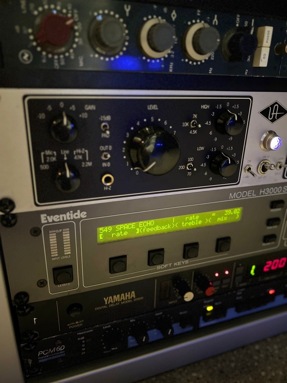 A rack of audio equipment. Includes a microphone preamp, signal processor, and digital reverb.
