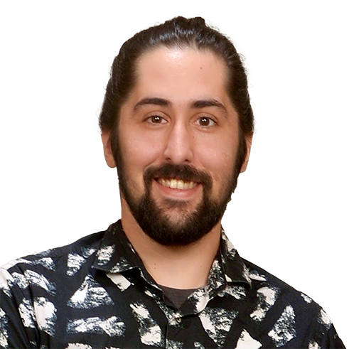 A man with a beard wearing a black and white shirt