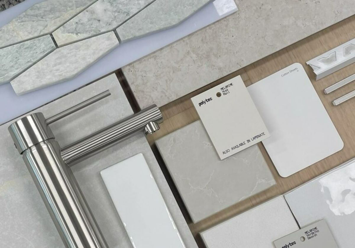 A Stainless Steel Faucet Is Surrounded by A Variety of Tiles — Evolution Building Group Dapto, NSW