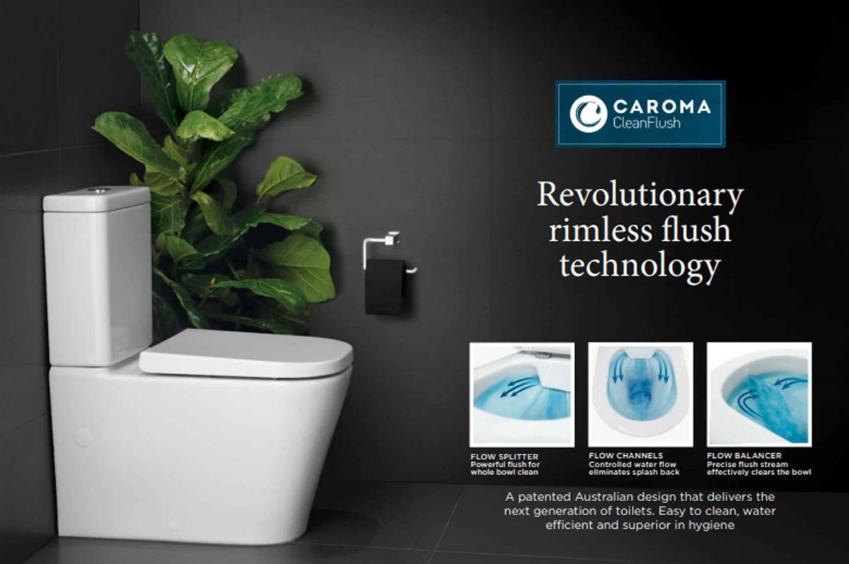 A Toilet with A Rimless Flush Technology Is Sitting in A Bathroom Next to A Plant — Evolution Building Group Dapto, NSW