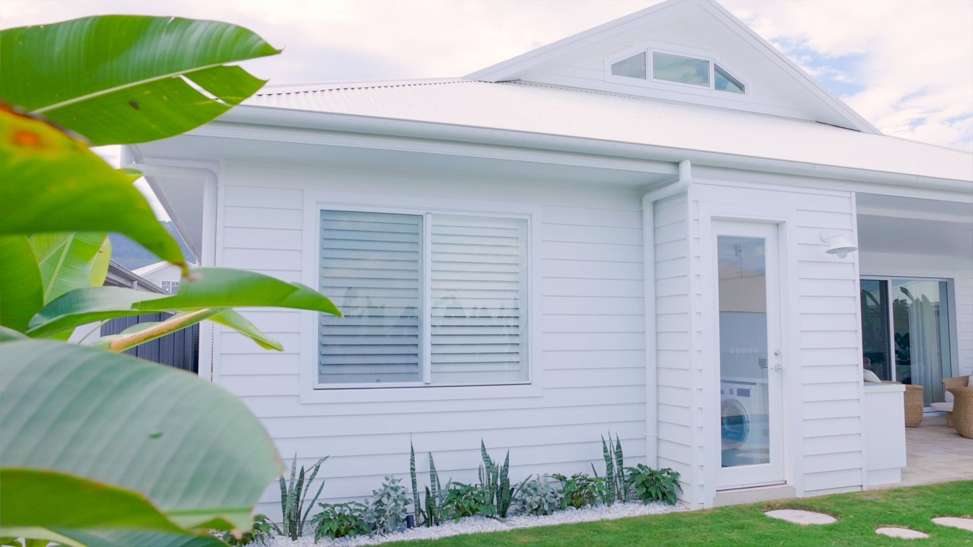 A White House With a Green Leaf in Front of It — Evolution Building Group Dapto, NSW