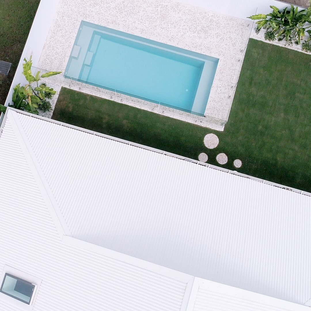 An Aerial View of a House With a Swimming Pool — Evolution Building Group Dapto, NSW