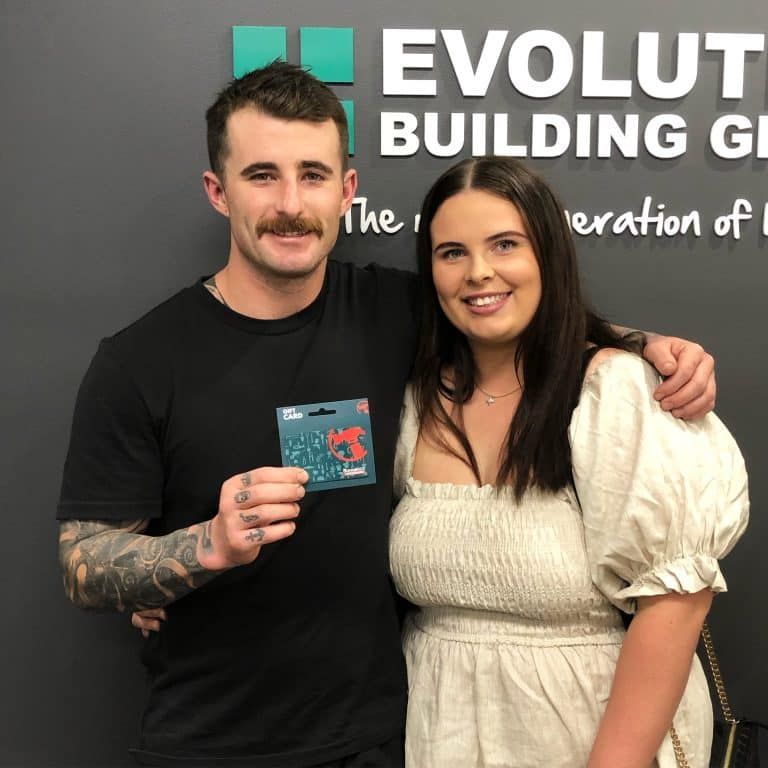A Man and Woman Are Posing for A Picture — Evolution Building Group Dapto, NSW