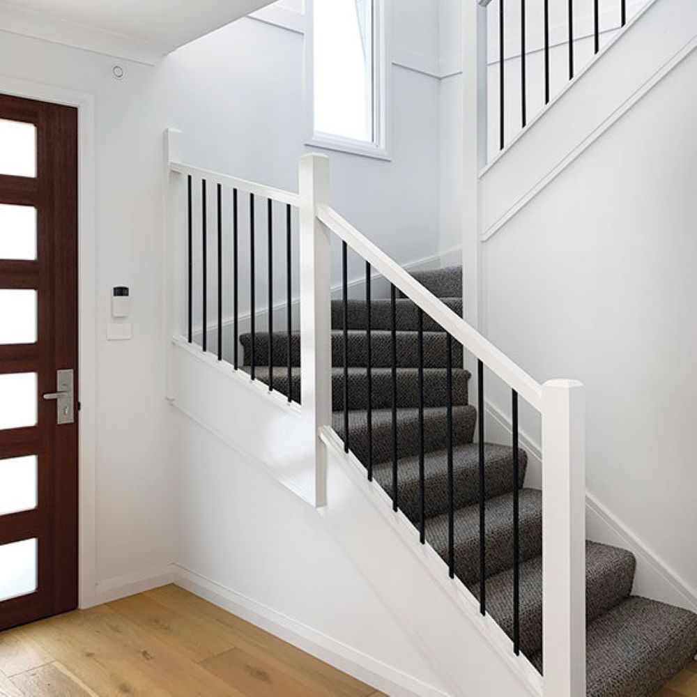 A Staircase with A White Railing and A Grey Carpet — Evolution Building Group Dapto, NSW