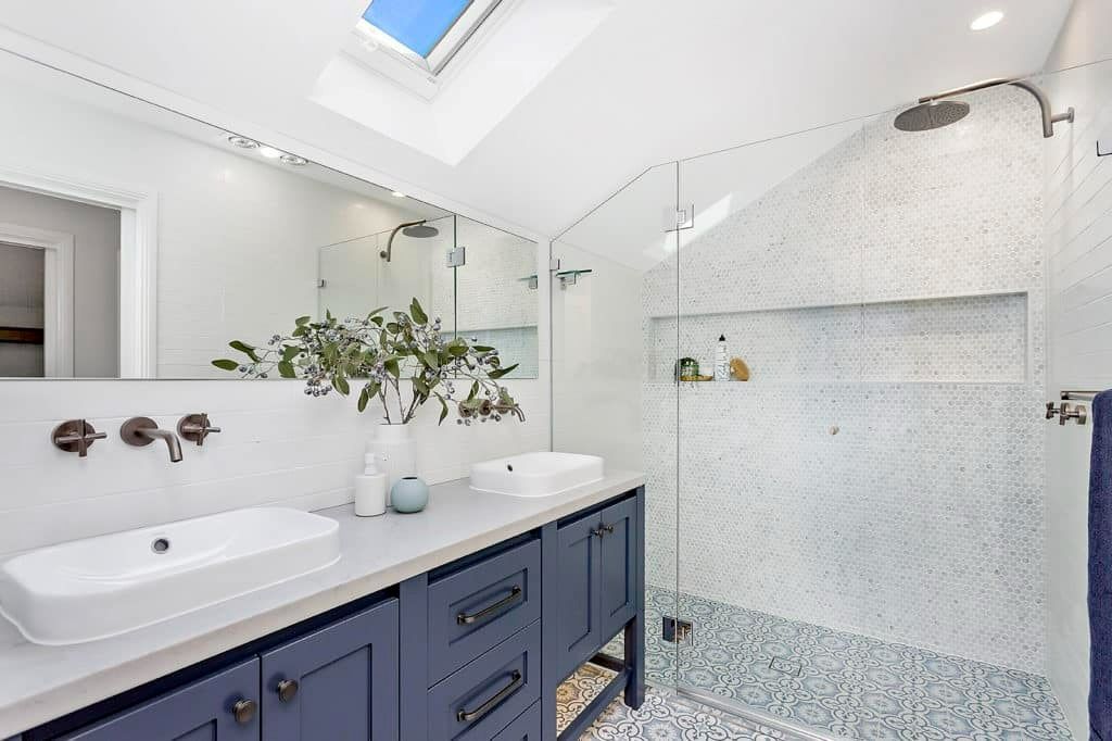 A Bathroom with Two Sinks, a Walk in Shower and A Skylight — Evolution Building Group Dapto, NSW