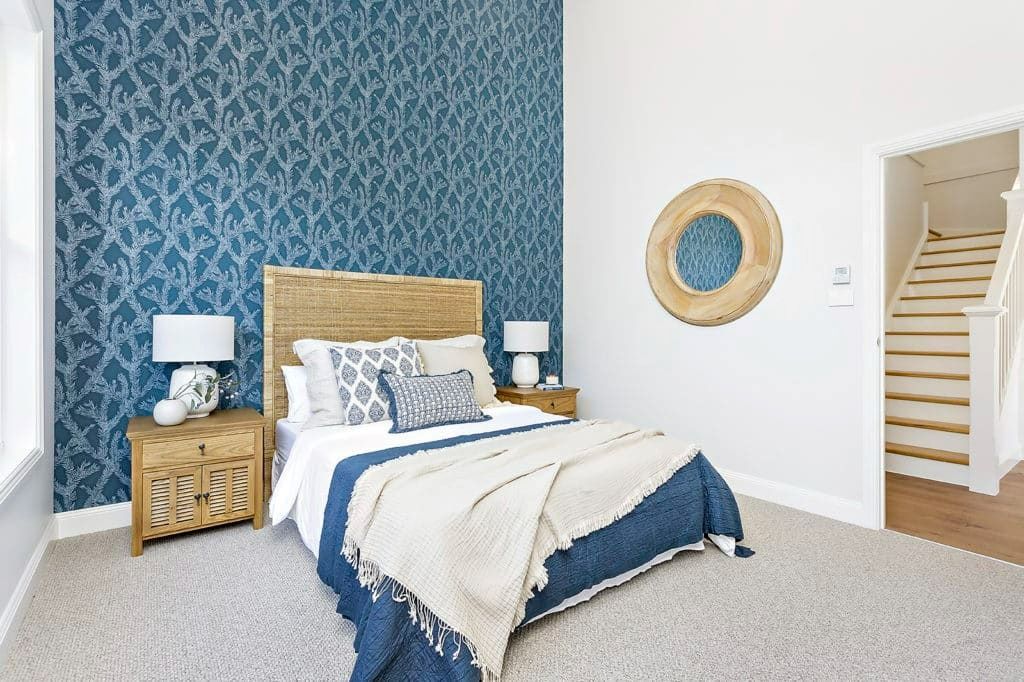 A Bedroom with A Bed, Nightstands, Lamps and Stairs — Evolution Building Group Dapto, NSW