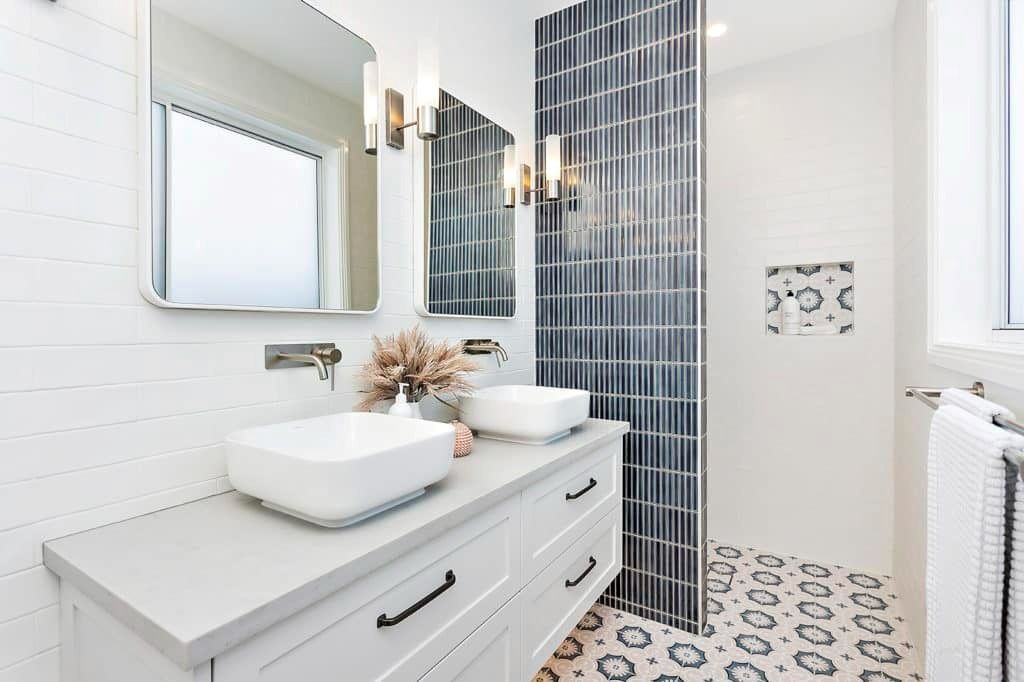 A Bathroom with Two Sinks, a Mirror and A Walk in Shower — Evolution Building Group Dapto, NSW