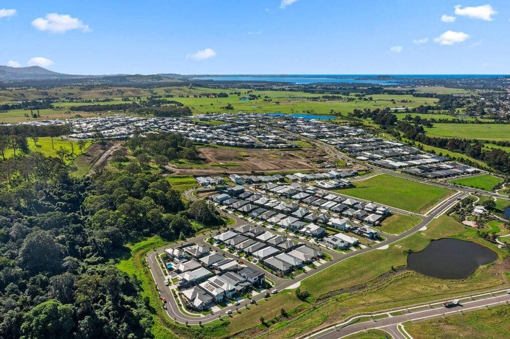 An Aerial View of A Residential Area Surrounded by Trees and Fields — Evolution Building Group Dapto, NSW