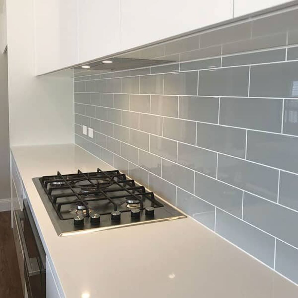 A Stove Top Oven Is Sitting on Top of A Counter in A Kitchen — Evolution Building Group Dapto, NSW
