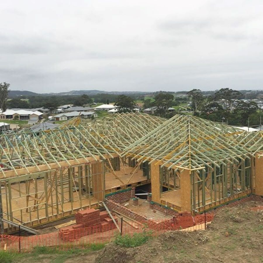 A Large Wooden House Is Being Built on Top of A Hill — Evolution Building Group Dapto, NSW