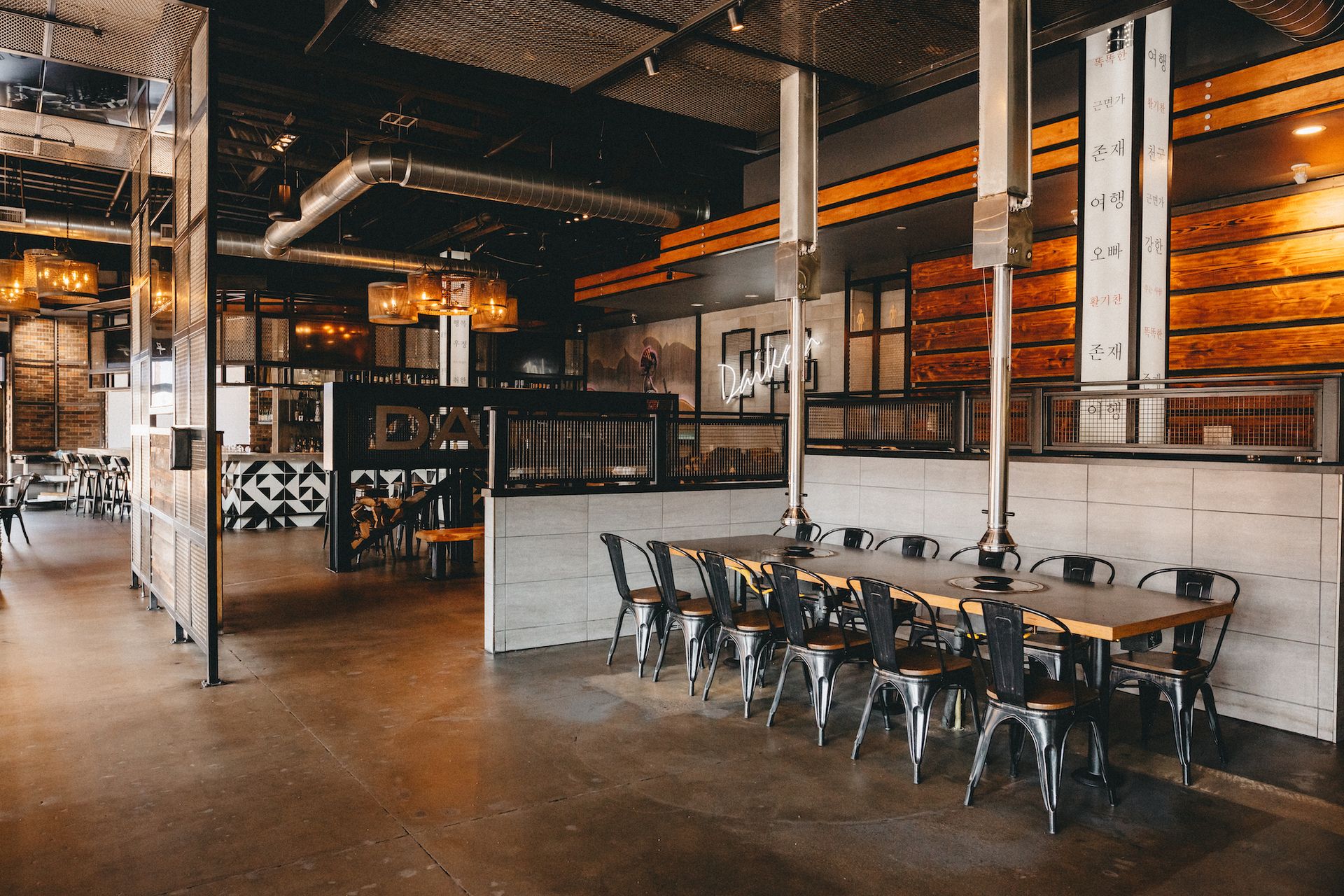 A large restaurant with tables and chairs in it.