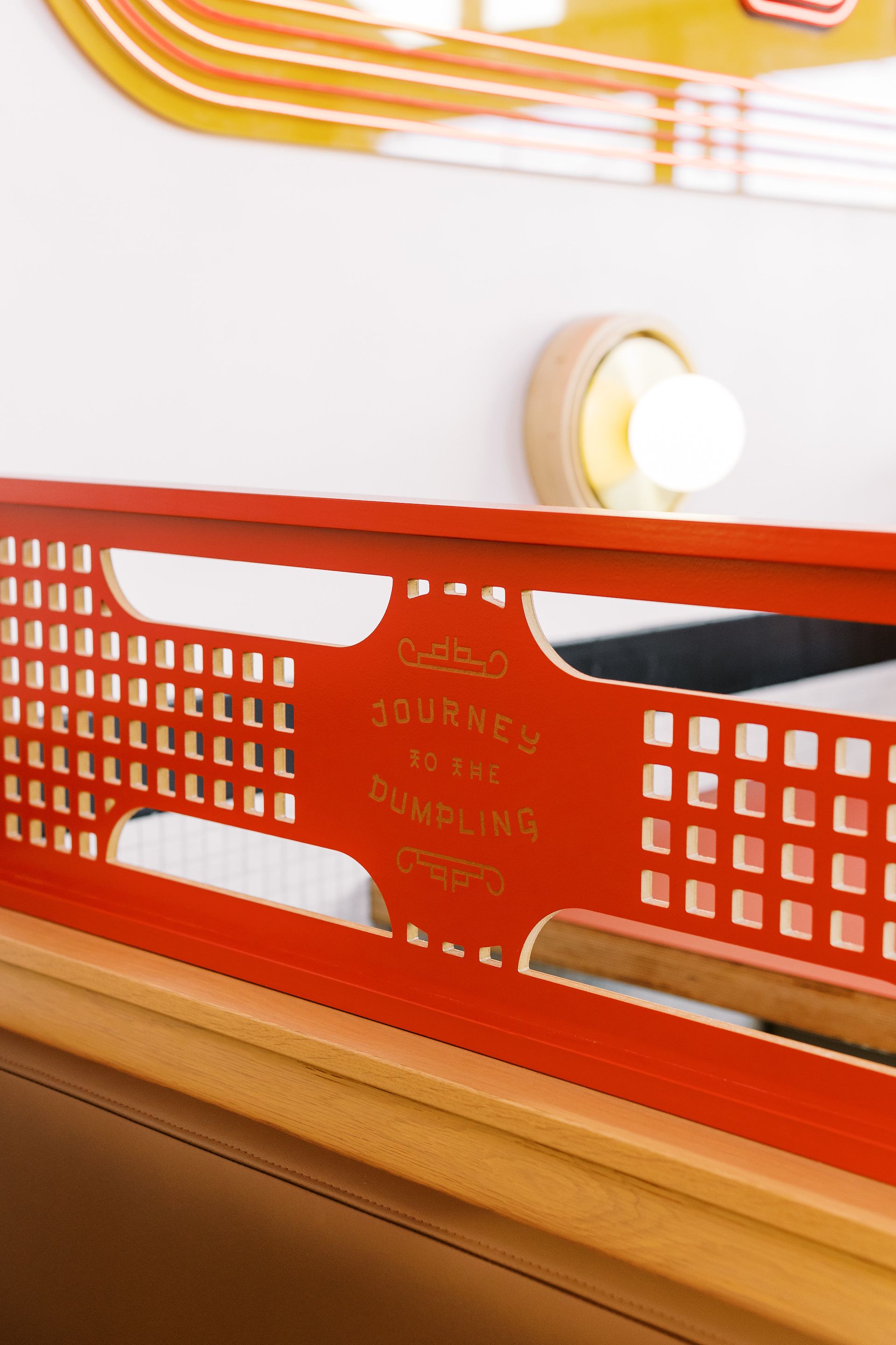 A booth in a restaurant that says Journey to the Dumpling on it