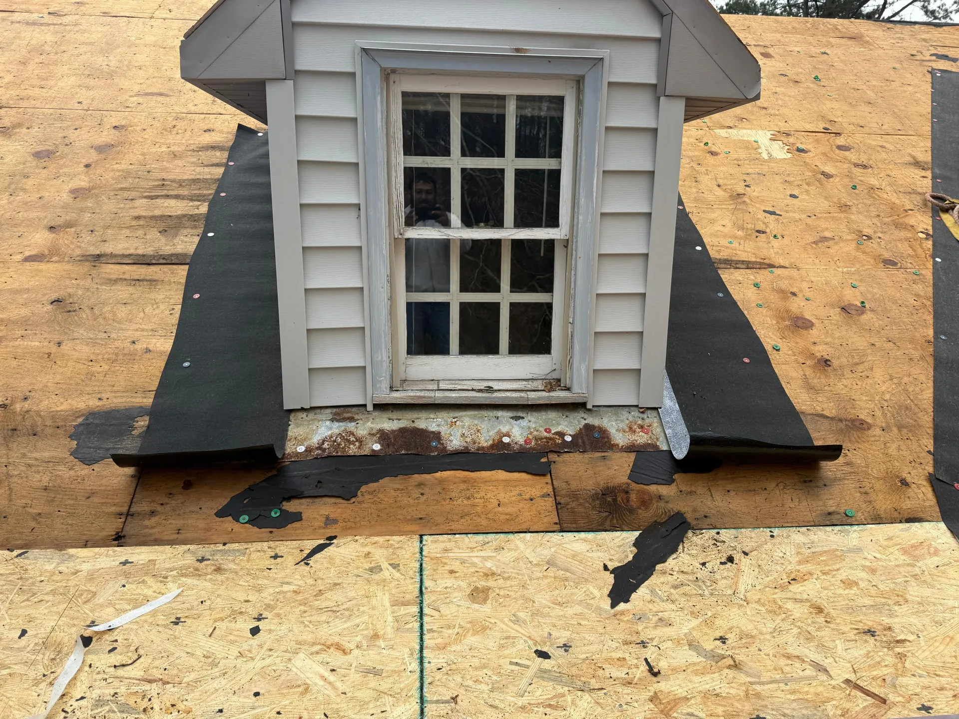 Damaged roof restored by Roof Pro NC to protect a home in New Bern, NC