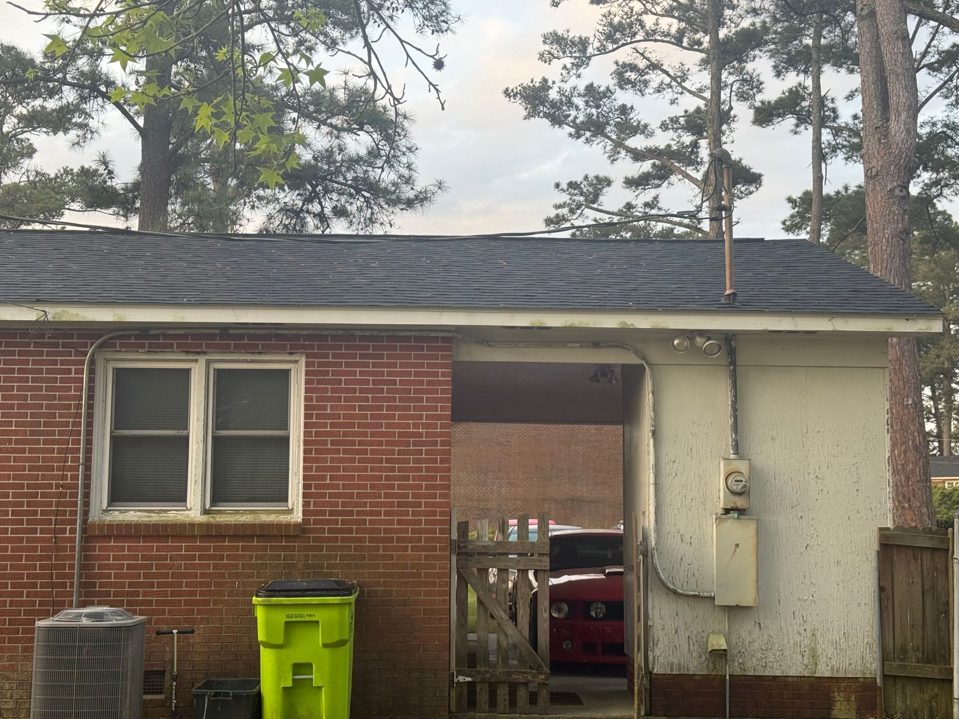 Damaged roof restored by Roof Pro NC to protect a home in New Bern, NC