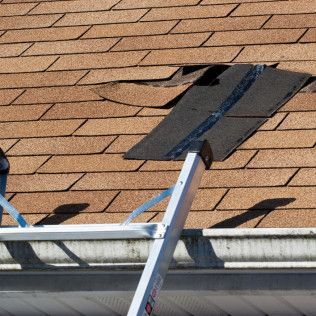 Roof Pro NC documenting storm-related roof damage for an insurance claim in New Bern, NC