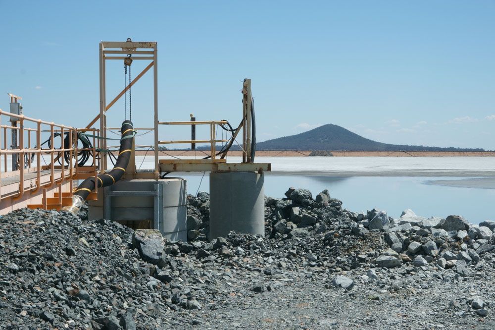 A large body of water with a mountain in the background — Hydro Excavation in Narellan, NSW