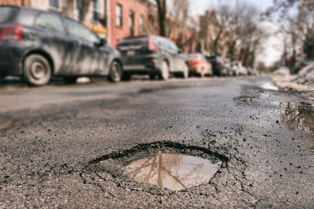 There is a pothole in the middle of the road — Hydro Excavation in Bowral, NSW