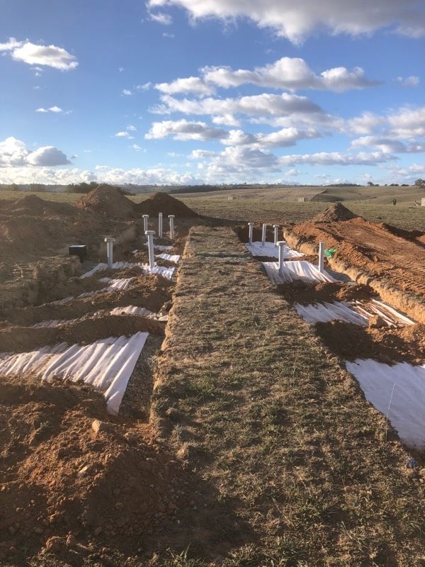 A group of construction workers are working on a construction site — Hydro Excavation in Goulburn, NSW