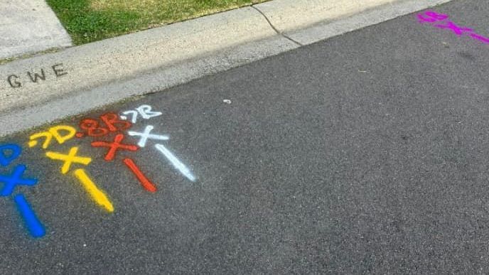 A Sidewalk With A Bunch Of Numbers Painted On It — East Coast Locating Services In Wyong, NSW
