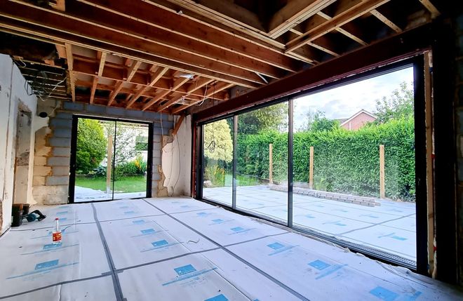Internal view of large triple cortizo sliding doors and double sliding doors. Best quality sliding door systems
