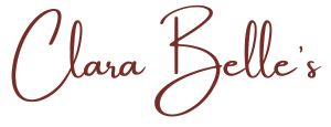 The logo for clara belle 's is written in cursive on a white background.