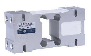 A metal block with holes in it and a label on it