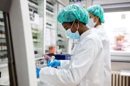 Two female scientists are working in a laboratory.