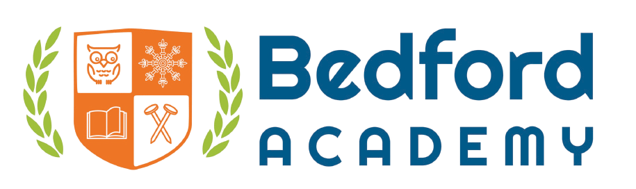 A logo for bedford academy with a shield and laurel wreath
