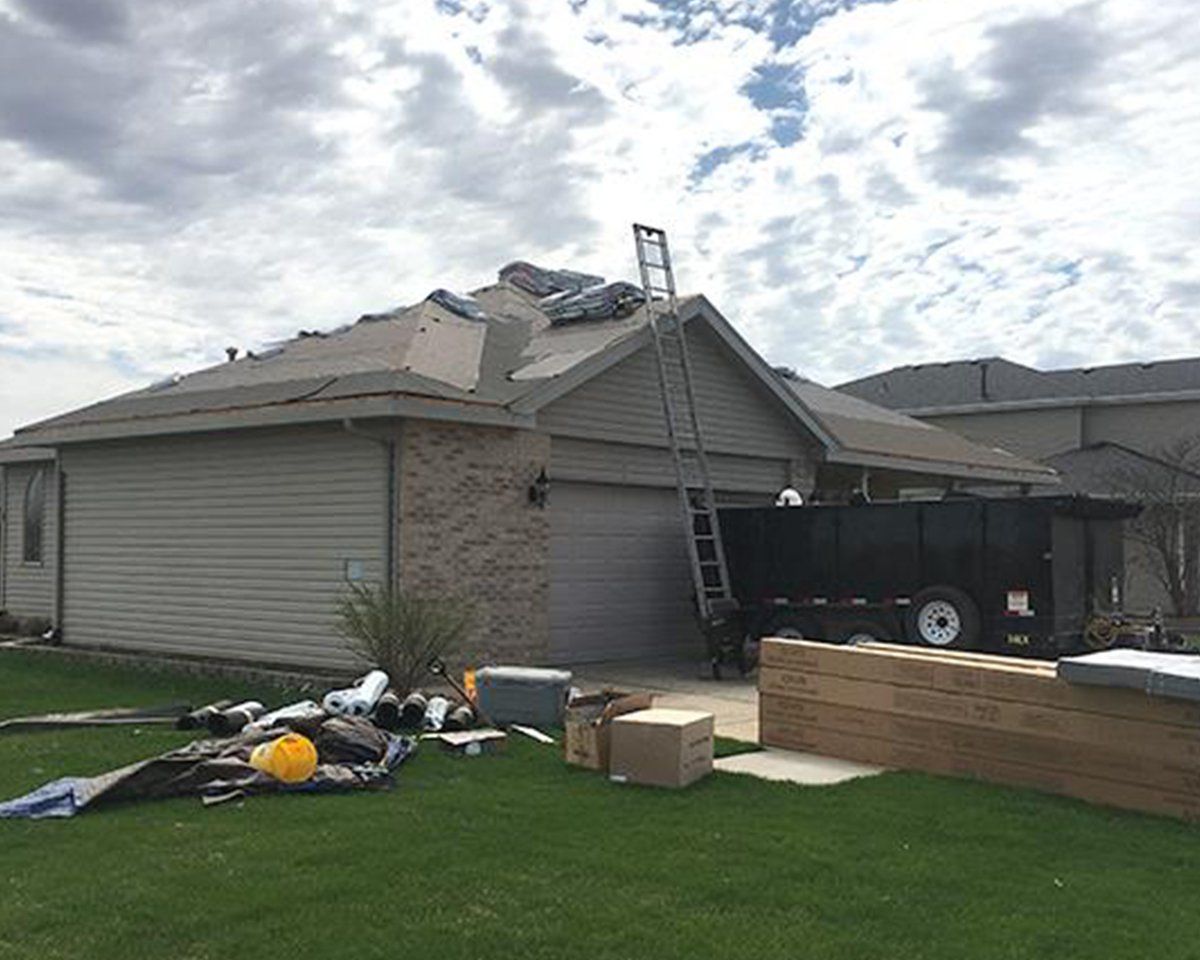 Home Roof Repair In Progress — Manhattan, IL — All Coast Restoration LLC
