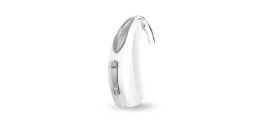 Side-view of a silver and white hearing aid on a white background