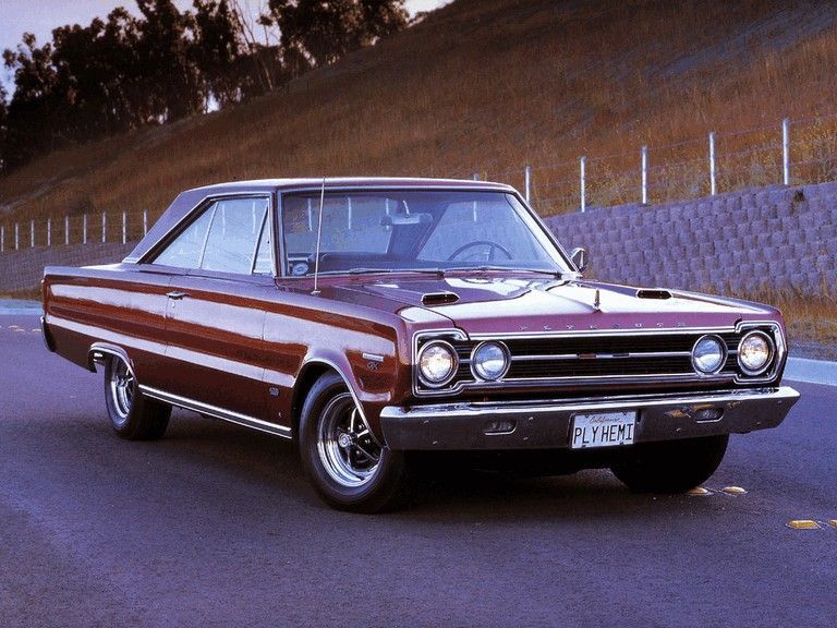 polished brown satallite parked in a driveway