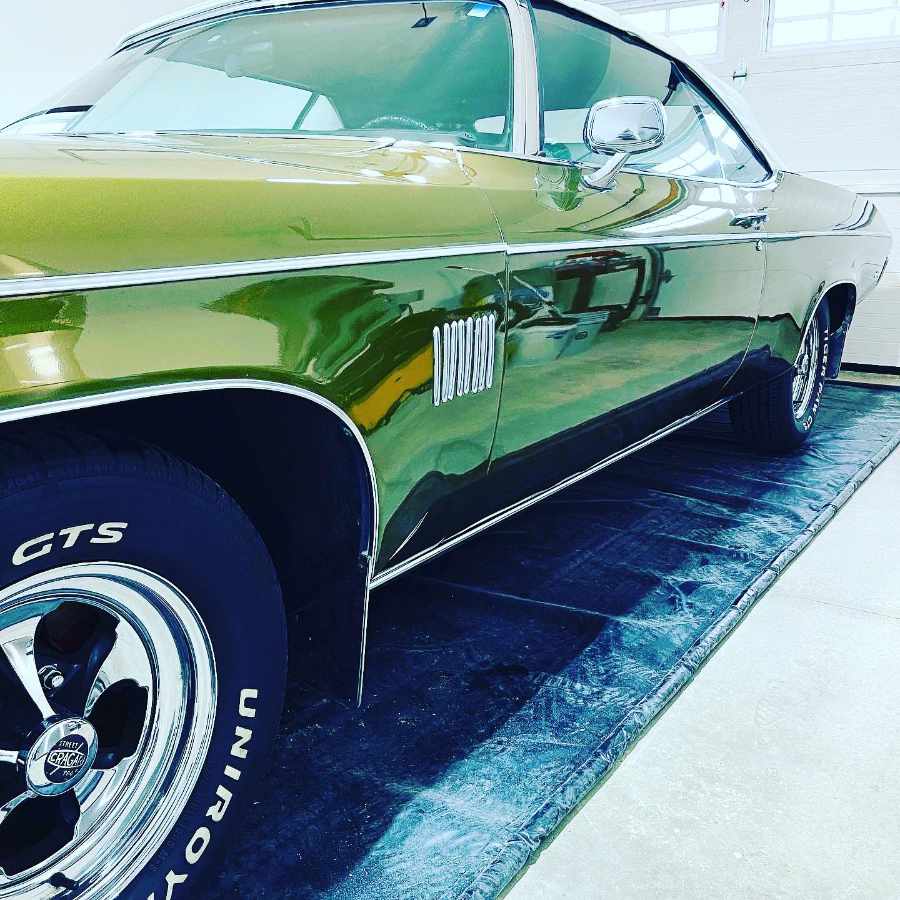 side of a glossy green delta 88